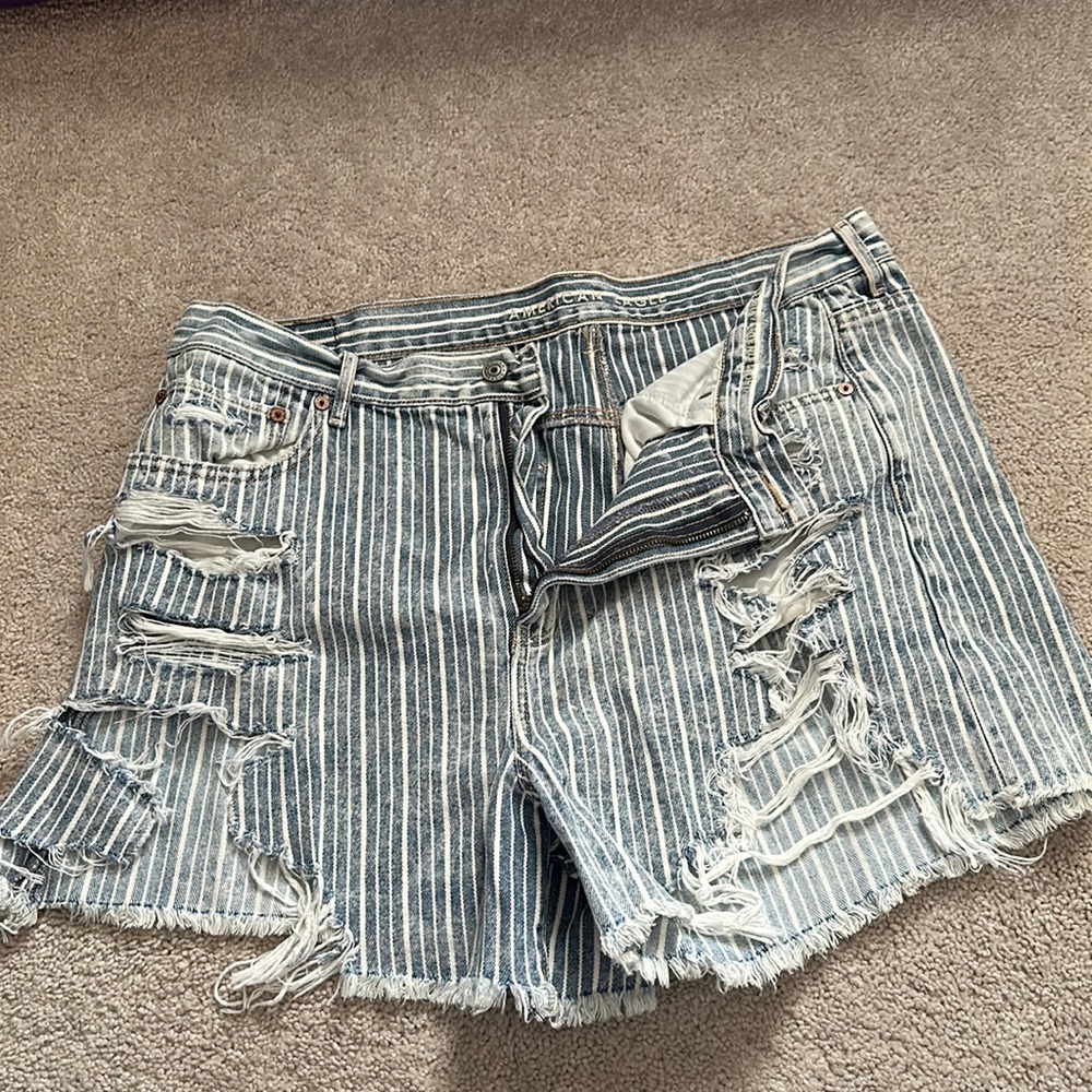 American Eagle jean shirts with distressed look.